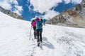 Trekkers walking on glacier at Chola pass to Gokyo village, Everest region in Himalaya mountain range, Nepal