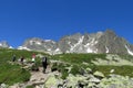 Trekkers walking on a hike to mountains Royalty Free Stock Photo