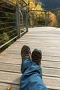 Trekking boots in the forest in autumn