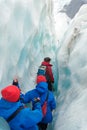 Trekking through the Franz Josef Glacier in New Zealand