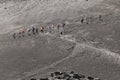 Trekking of hikers and tourists who walk to the Etna volcano crater -Sicily