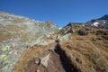 Trekking in the Italian Alps; it's autumn with no people around Royalty Free Stock Photo