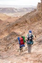 Trekking in Negev dramatic stone desert, Israel