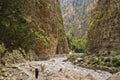 Trekking on a path through Samaria gorge near Iron gate, south west part of Crete island