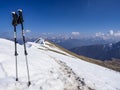 Trekking poles on an alpine trail in the italian alps Royalty Free Stock Photo