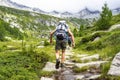 Trekking scene in the italian alps of Val Masino Royalty Free Stock Photo