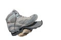 Trekking shoe broken after intensive use (isolated) Royalty Free Stock Photo
