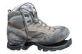 Trekking shoe broken after intensive use (isolated) Royalty Free Stock Photo