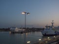 TRELLEBORG, SWEDEN - August 21, 2019: Baltic ferry boats at Trelleborg harbor Swedish port, blue hour evening