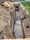 Trench with pipes, repair work on the water supply
