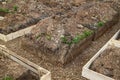 trench with rubble and formwork, which is prepared for pouring t