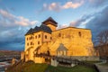 The Trencin Castle above the town of Trencin at sunset, Slovakia Royalty Free Stock Photo