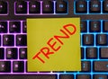 TREND text on yellow paper on the keyboard