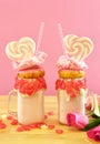 Valentine`s Day freak shakes with heart shaped lollipops and donuts.