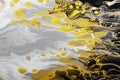 Trending colors of 2021. Horizontal Flow of gray paint with yellow bubbles drops. Marble effect background or texture