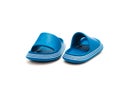 Trending cute pair of blue open toe pillow slide sandals for toddler non-slip foam slippers isolated on white Royalty Free Stock Photo