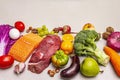 Trending paleo/pegan diet. Healthy balanced food concept. Set of fresh products, raw meat, salmon, vegetables and fruits Royalty Free Stock Photo