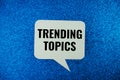 Trending Topics text message written on white bubble speech