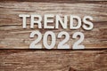 Trends 2022 alphabet letters on wooden background Royalty Free Stock Photo