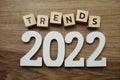 Trends 2022 word alphabet letters on wooden background Royalty Free Stock Photo