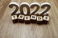 Trends 2022 word alphabet letters on wooden background Royalty Free Stock Photo