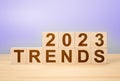 Trends 2022 word alphabet letters on wooden cubes, very peri color background. 2023 trends new year concept Royalty Free Stock Photo