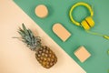 Trendy abstract yellow green background with pineapple and geometric forms for product presentation. Summer concept. Flat lay,