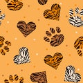 Seamless pattern of animal skin in shape of heart and paw: leopard, tiger and zebra. Royalty Free Stock Photo