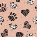 Seamless pattern of animal skin in shape of heart and paw: leopard, tiger and zebra. Royalty Free Stock Photo