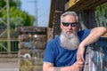 Trendy attractive bearded man in sunglasses Royalty Free Stock Photo