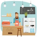 Trendy bearded barista making coffee in coffeeshop