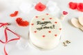 Trendy bento cake with cute decor on a light background