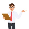 Trendy business man in eye glasses holding clipboard and presenting hand. Young person keeping notepad, document, folder or report