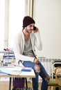 Trendy businessman hipster informal look smiling happy on mobile phone Royalty Free Stock Photo