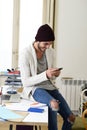 Trendy businessman hipster informal look smiling happy on mobile phone Royalty Free Stock Photo