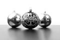 Trendy Christmas silver and black balls decor on isolated white and black background. Close-up. Christmas backdrop for Royalty Free Stock Photo