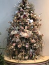 Elves in christmas tree. Romantic Christmas tree with balls, flowers, elves in pastel shades