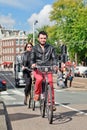 Trendy citizens on their bicycle, Amsterdam, netherlands