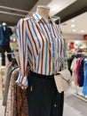 Trendy clothes on female display mannequin