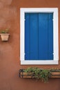 Trendy Color of the year 2020 Classic Blue old italian window background. Outdoor architecture decoration. Mediterranean Royalty Free Stock Photo