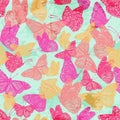 Trendy colorful seamless pattern with flying butterfly on grunge painted texture Royalty Free Stock Photo