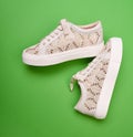 Trendy comfortable beige knitted design sneakers with white thick rubber soles
