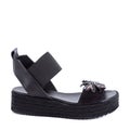 Trendy comfortable female summer black shoes (mule) on a white background.