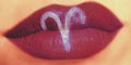 Trendy Creative Lip Makeup. Closeup Shiny Glossy Lips With Aries