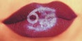 Trendy Creative lip makeup. Closeup Shiny glossy lips with Cance