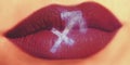 Trendy Creative lip makeup. Closeup Shiny glossy lips with Sagit