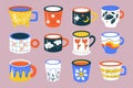Trendy cups. Beautiful tea and coffee mugs, color patterned crockery, cute hot morning drinks ceramics, different designs cozy Royalty Free Stock Photo