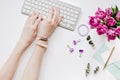 Trendy design of workdesk with blossom on white background top view Royalty Free Stock Photo