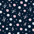 Trendy ditsy floral seamless pattern in vector. Cute pink and blue flowers on dark background. Royalty Free Stock Photo