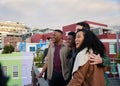 Trendy, Diverse group of friends looking at view of city, standing together on rooftop at party in the city Royalty Free Stock Photo